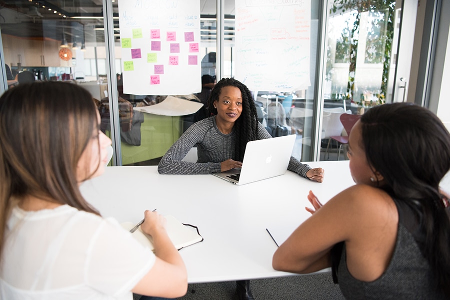 Group of people in office talking